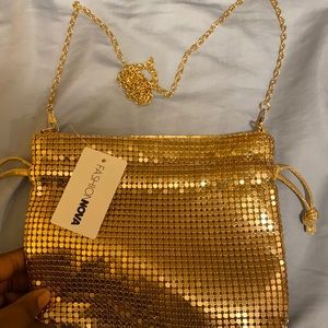 Gold cross bag or clutch